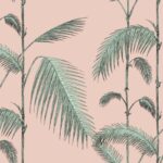 Illustratie van palmbladeren in groen op een lichtroze achtergrond.