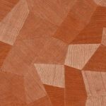 Detail van het Arte Facet 75307 behang met geometrisch patroon in koperkleurige textuur.