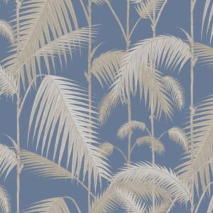 Beige palmbladeren op een blauw achtergrondpatroon.