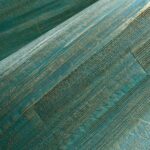 Detailopname van de groene textuur van het Arte All Naturals Camago 14003A behang met een geweven en natuurlijke uitstraling.