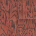 Close-up van het Arte-Coti 30800 behang in de kleur fire orange met een houtnerfstructuur.
