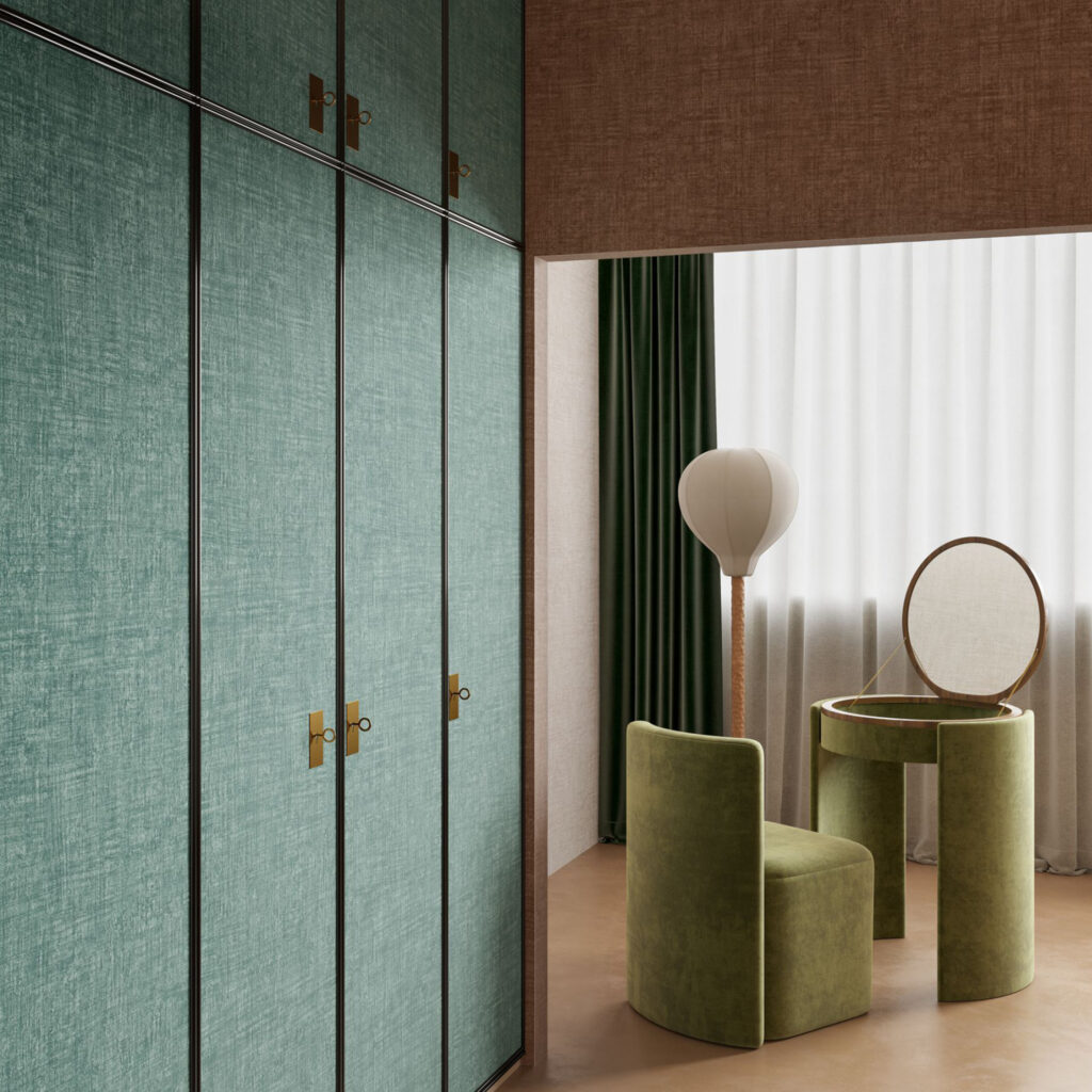 Moderne kleedkamer met Arte Essentials Brushed Suede behang, een groene kast, fluwelen stoel en een ronde kaptafel voor een groot raam.
