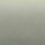 Lichtgroen tot grijsgroen kleurverlopend Arte Joy Zenitude JOY83 behang met een zachte, matte textuur.