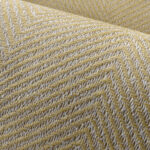 Detailopname van de gele en witte visgraatstructuur van de stof Arte Marquesa Atuona 31723.