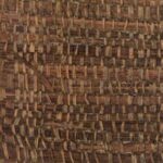 Natuurlijke wandbekleding met een grof geweven structuur in aardetinten uit de Arte Melaky Tana collectie.