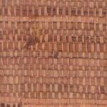 Vlechtwerkbehang met een natuurlijke hout- en rietstructuur uit de Arte Melaky Tana collectie.