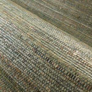 Detailopname van het geweven behang Arte Melaky Tana 40748 met een natuurlijke structuur en aardetinten.