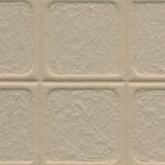 Beige reliëfbehang met een tegelstructuur uit de Arte Terra Arcilla 23932 collectie van Buningh.