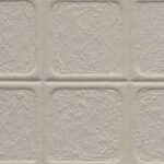 Beige behang met een reliëfstructuur in een tegelpatroon uit de Arte Terra Arcilla 23933 collectie van Buningh.