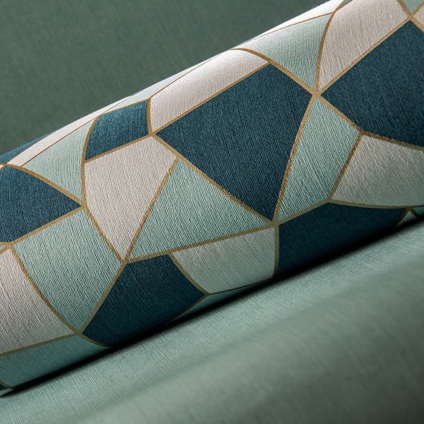 Rol Arte-behang Insolence Blast met geometrisch patroon in blauw-, wit- en goudtinten op een groene achtergrond.