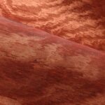 Detail van Arte-behang Kharga Moiré 15012A in de kleur sunset orange met een glanzende textuur en golvend patroon.