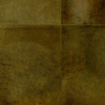Close-up van Arte behang Les Cuirs Rectangle 33500 met een textuur van warme, bruine lederen panelen.