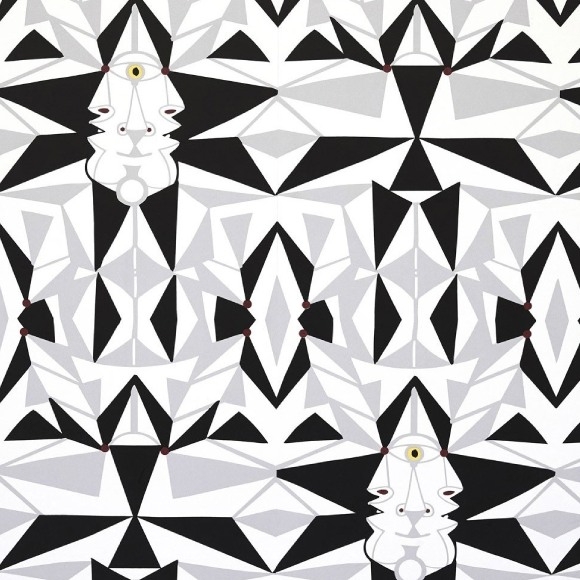 Grafisch behang van Lelievre met zwart-wit geometrisch patroon en gestileerde gezichten geïnspireerd op Cocteau.