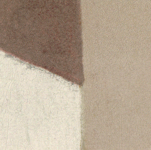 Abstracte close-up van het Buningh Elitis Osorno VP 963 02 behang uit de Ortigia collectie in beige- en bruintinten.