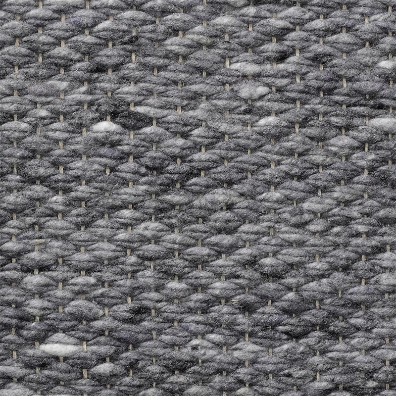 Close-up van het grijs geweven Perletta Finesse vloerkleed van Buningh Wonen.