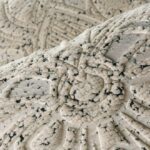 Detailopname van het structuurrijke Arte Moooi Mimic Moth behang met een reliëf van een mot.