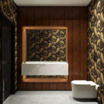 Luxe badkamer met Cole & Son Palm Leaves-behang in goud op zwarte achtergrond en marmeren wastafel.
