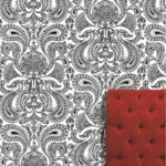 Zwart-wit Cole and Son Malabar behang met sierlijk paisley-patroon en een rood fluwelen gestoffeerde stoel in de hoek.