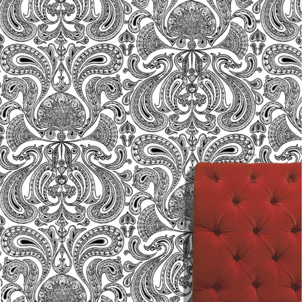 Zwart-wit Cole and Son Malabar behang met sierlijk paisley-patroon en een rood fluwelen gestoffeerde stoel in de hoek.