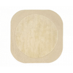 Beige Elitis Alaska TA 125 03 07 vloerkleed met een ronde kern en afgeronde hoeken.
