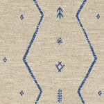 Beige Elitis Tampico LR 355 41 stof met blauwe, geometrische en etnische patronen.