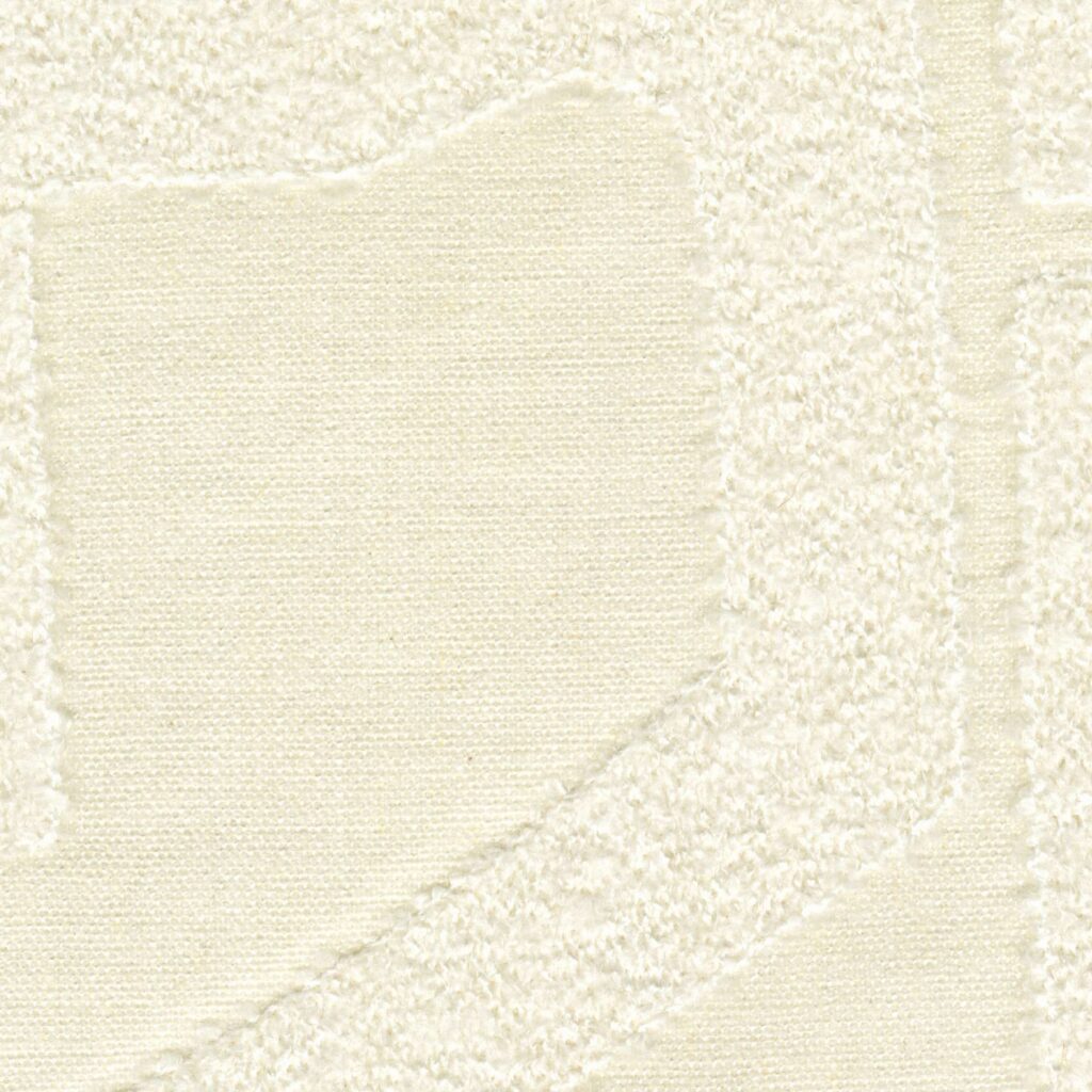 Close-up van de Elitis Baleares Eivissa LR 370 01 stof met een reliëfpatroon in een lichte beige kleur.