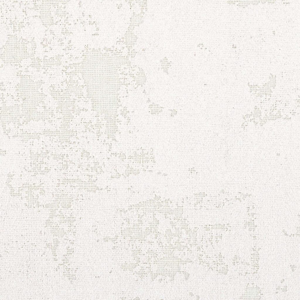 Lichtbeige Elitis-behang Lin Plâtre met subtiele textuur en verweerd artistiek patroon.