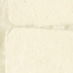 Close-up van Elitis Hanji Nishino RM 1059 01 behang met een textuur van handgeschept papier in een lichte crèmekleur.