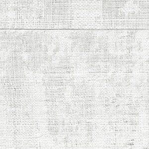 Lichtgrijs Elitis-behang met een grove, linnenachtige textuur uit de La Caravane Atelier d’Artiste Eldorado collectie.
