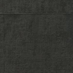 Donkergrijs Elitis-behang met een grove, textiele structuur uit de La Caravane Atelier d’Artiste Eldorado collectie.