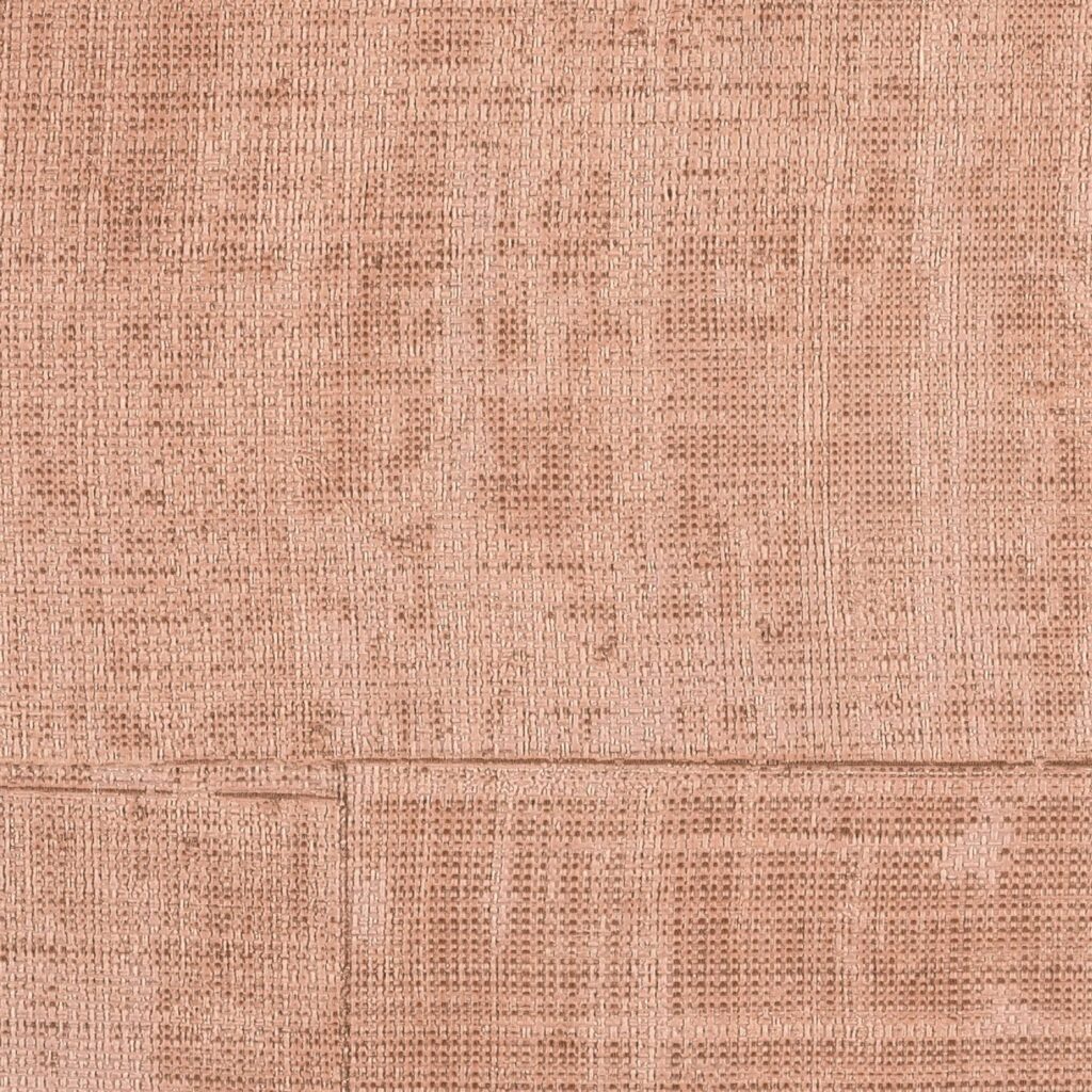 Structuurvol Elitis behang uit de La Caravane collectie in een warme terracotta kleur met geweven textuureffect.