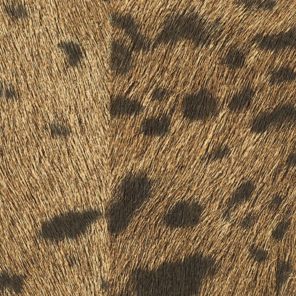 Detail van Elitis-behang Memoires Panthere VP 653 07 met een panterprint in bruin- en zwarttinten.