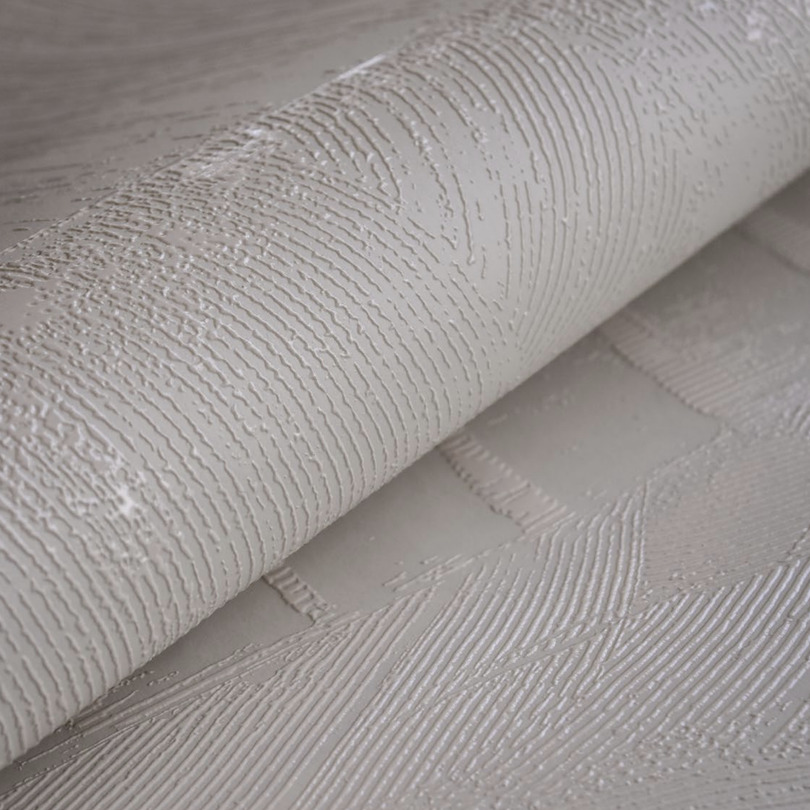 Close-up van Elitis behang uit de Mouvements Esprit Libre RM 1024 collectie met een reliëfstructuur en abstract patroon.