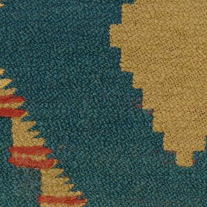 Detailopname van het textielpatroon Elitis Escondido Ploha LR 362 67 met geometrische vormen in oker, rood en diepblauw.