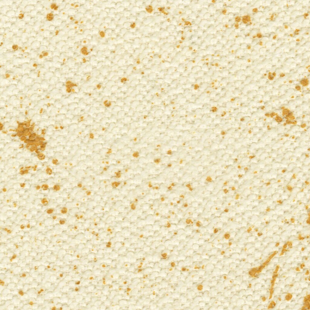 Close-up van Elitis Excentric Jacky stof in beige met goudbruine spikkels en textuur.