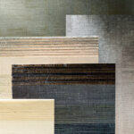 Stalen van de Elitis Silver collectie met diverse geweven texturen en metallic tinten.