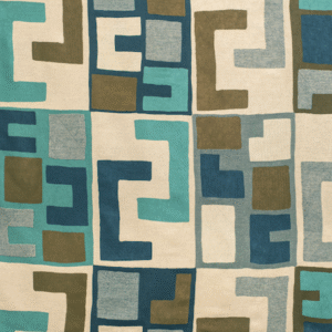Abstracte Elitis-stof Escale (LZ 871 40) met geometrisch patroon in blauwtinten, groen en beige.