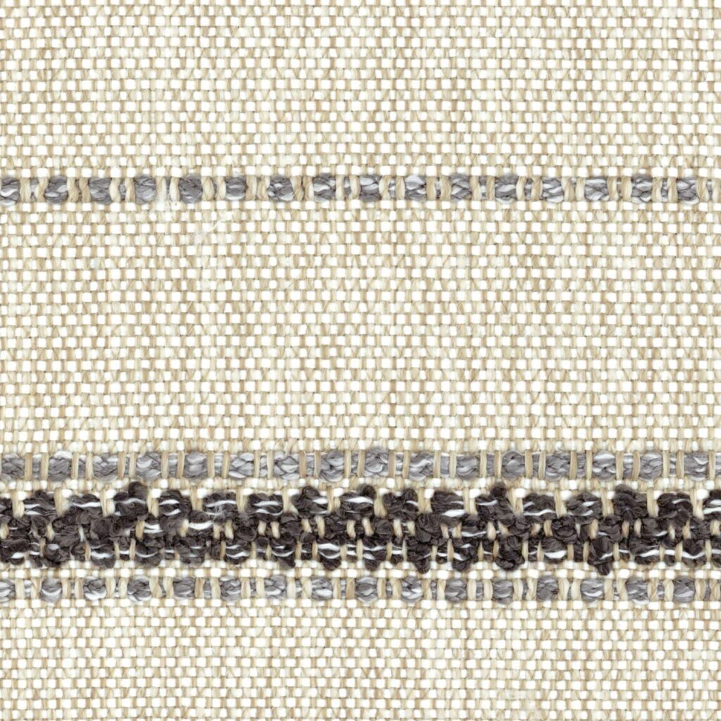 Close-up van Elitis-stof Acosta Mendoza OD 138 85 met een geweven patroon in beige, grijs en donkerbruin.