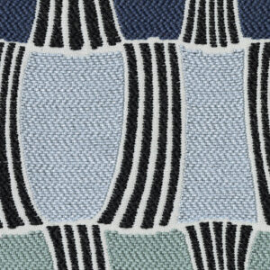 Detail van de Elitis-stof Acosta Santa Cruz OD 141-45 met een geometrisch patroon in blauw, groen en zwart.
