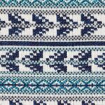 Detail van Elitis-stof Acosta Santa Rosa OD 137 45 met een geweven patroon in blauw, turquoise en wit.