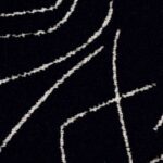 Donkerblauwe Elitis-stof Alchimia Scala LR 345-80 met abstracte, gebroken witte lijnpatronen.