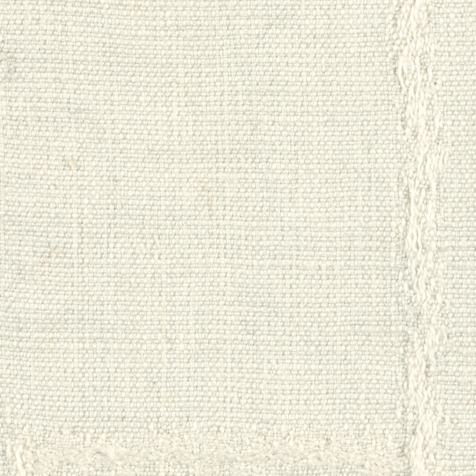 Licht beige Elitis Esprit LI 871-01 stof met subtiele geweven structuur en decoratief randmotief.