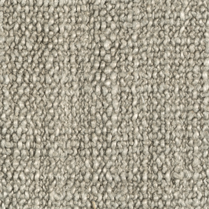 Close-up van de grijsbeige meubelstof Elitis Esprit LI 872 04 met een grove geweven textuur.