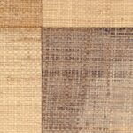 Vierzijdig geweven behang Elitis Tribus Comporta RM 1079 42 in natuurlijke beige- en bruintinten.