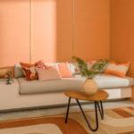 Modern ingerichte woonkamer met het Elitis-vloerkleed Penny Lane TA 119 35 04 in warme aardetinten.
