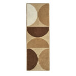 Langwerpig Elitis vloerkleed Rocky Caramel met geometrisch patroon in aardetinten.