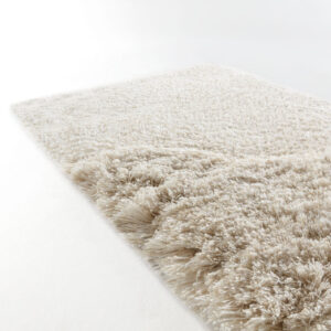 Detail van het limited edition vloerkleed Cosmic Cocoon in de kleur Alabaster met een zachte, hoogpolige textuur.