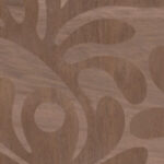 Houten oppervlak met ingegraveerd organisch patroon uit de Moooi Woodblock Beetle Fern collectie.