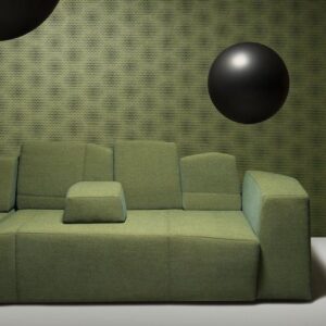 Groene bank voor een muur met het grafisch patroon van Moooi-behang Blooming Seadragon.