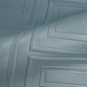 Detail van het blauwe fluwelen oppervlak met reliëfpatroon van het Objet Manoir M-520E-2 meubel.